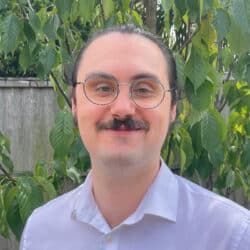 Josh Gardner, Senior Civil Engineer at Create Consulting Engineers, wearing glasses and light blue shirt