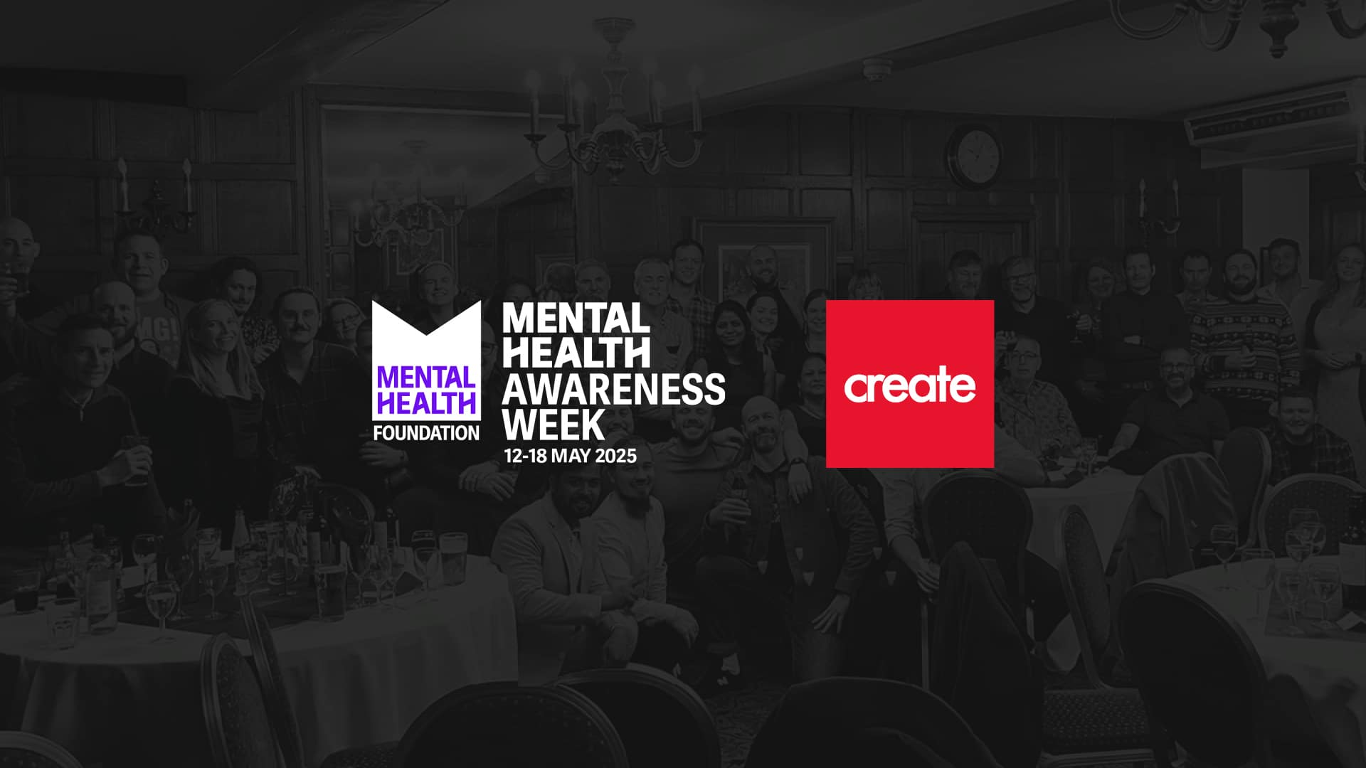 A large group of people pose together in a banquet hall behind logos for Mental Health Awareness Week 2025 and Create.